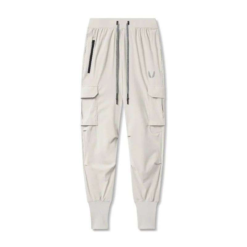 Men's Pants with Functional Pockets0825. Tetra-Lite™ Cargo High Rib Jogger - Stone "Reflective"