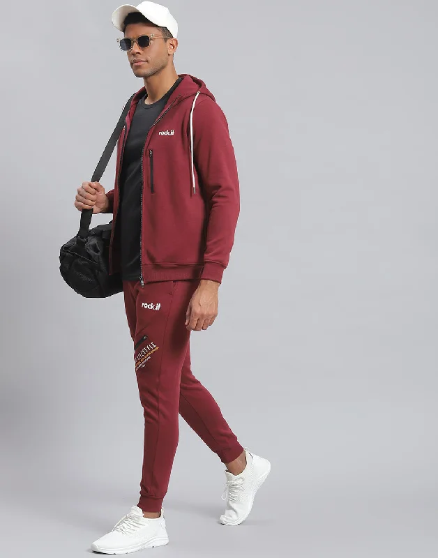 Men Maroon Solid Hooded Full Sleeve Tracksuit